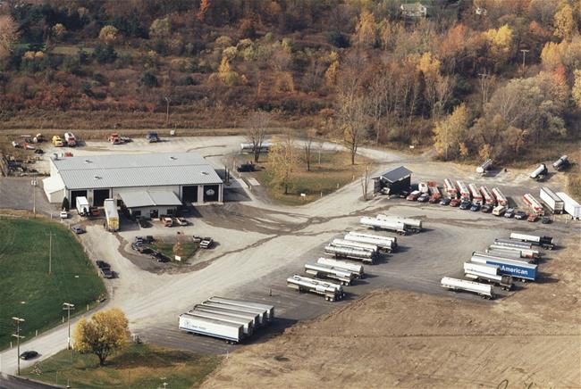 1991 - The business and property are expanding! The land is being cleared for additional trailer storage space, and the building will be added on to 3 more times before it is what we currently have.