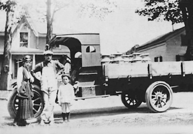 1916 - Charles A. Terpening begins hauling cream in cans from local farms doing business as C.A. Terpening Trucking Company.