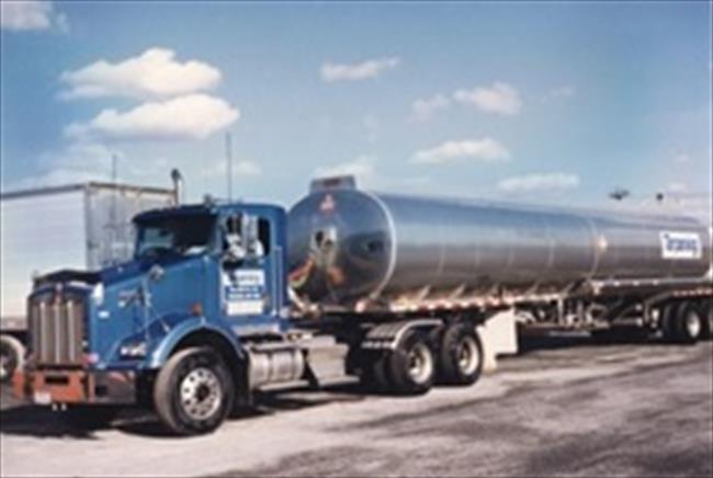 2000 Kenworth, with a 99 Heil trailer - Rated 12,000 gallons, tandem axle; a second building was added on to the original building at Farrell Rd.